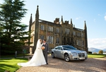 Ross Priory with Bridal car and couple