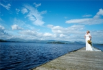 Bride on Jetty with Ben Lomond in Distance