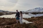 Bride and Groom walking in the Scottish moors