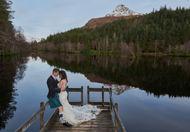 Glencoe Lochan reflections with bride and groom